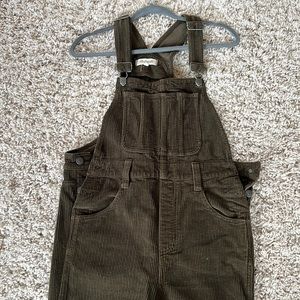 Green corduroy overalls